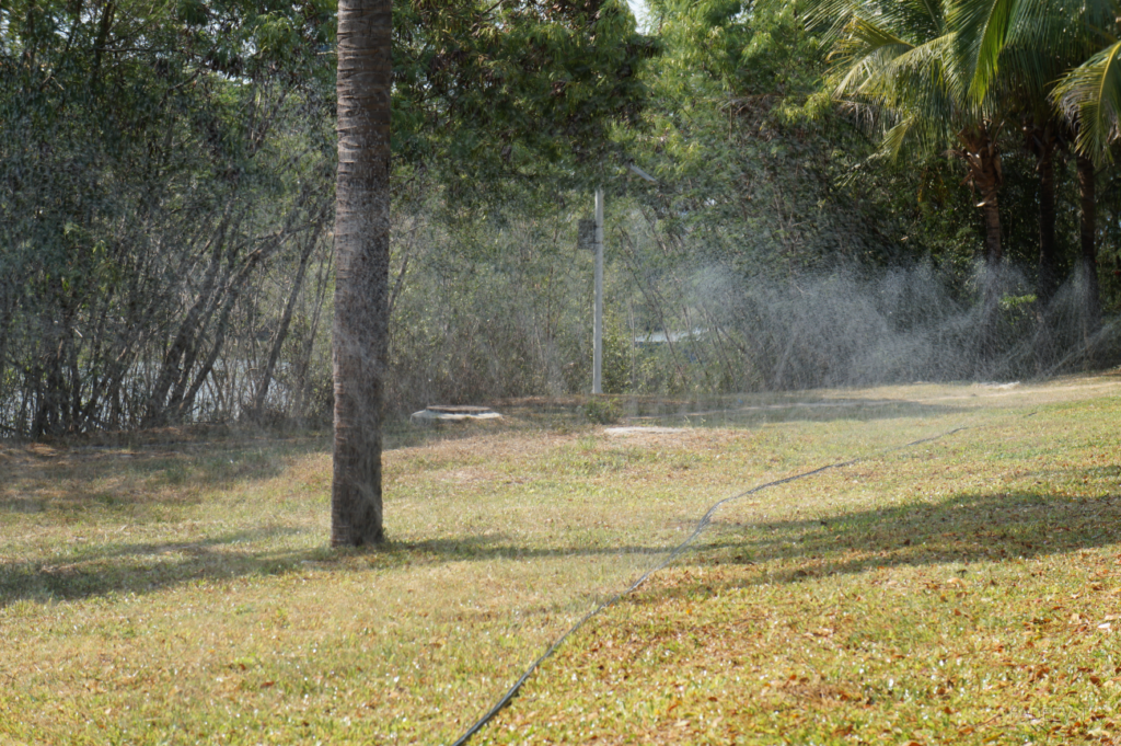 Grass irrigation in a park, Sanya, Hainan Island, China