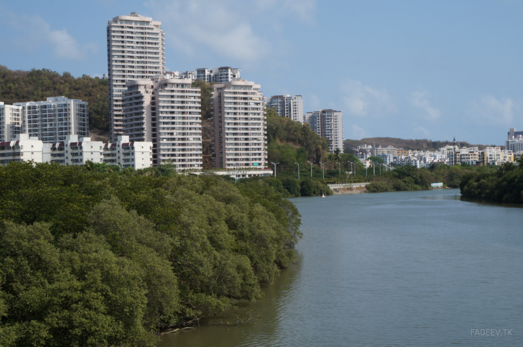 View of residential buildings from the bridge across the Lin Chun he River, Sanya, Hainan Island, China